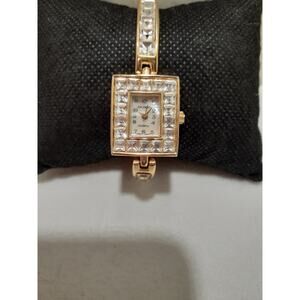 Da Vanci Ladies Wristwatch Gold Tone with crystals Face Band